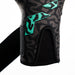 Close-up of the Speed Sleeve entry and latex wrist strap on the OG1 Mentality Monster