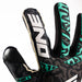 Close-up of the teal camo backhand on The One Glove OG1 Mentality Monster
